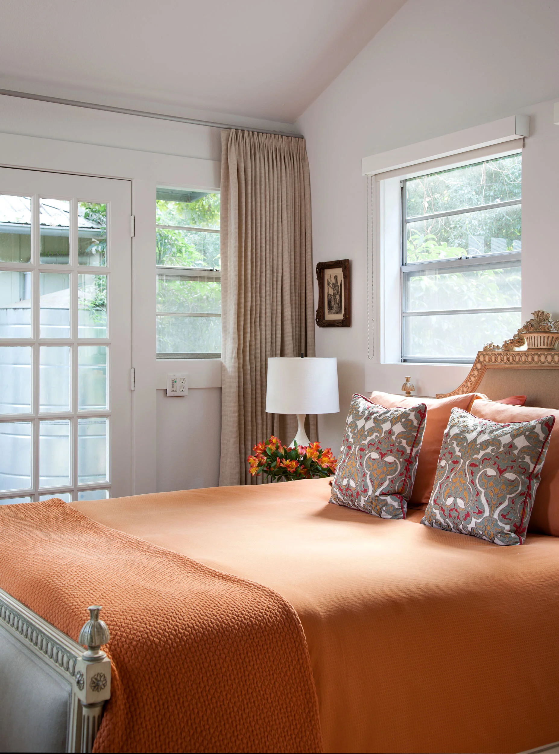  Casita bedroom with eclectic art and furnishings at Avenue H, designed by Mark Cravotta. 