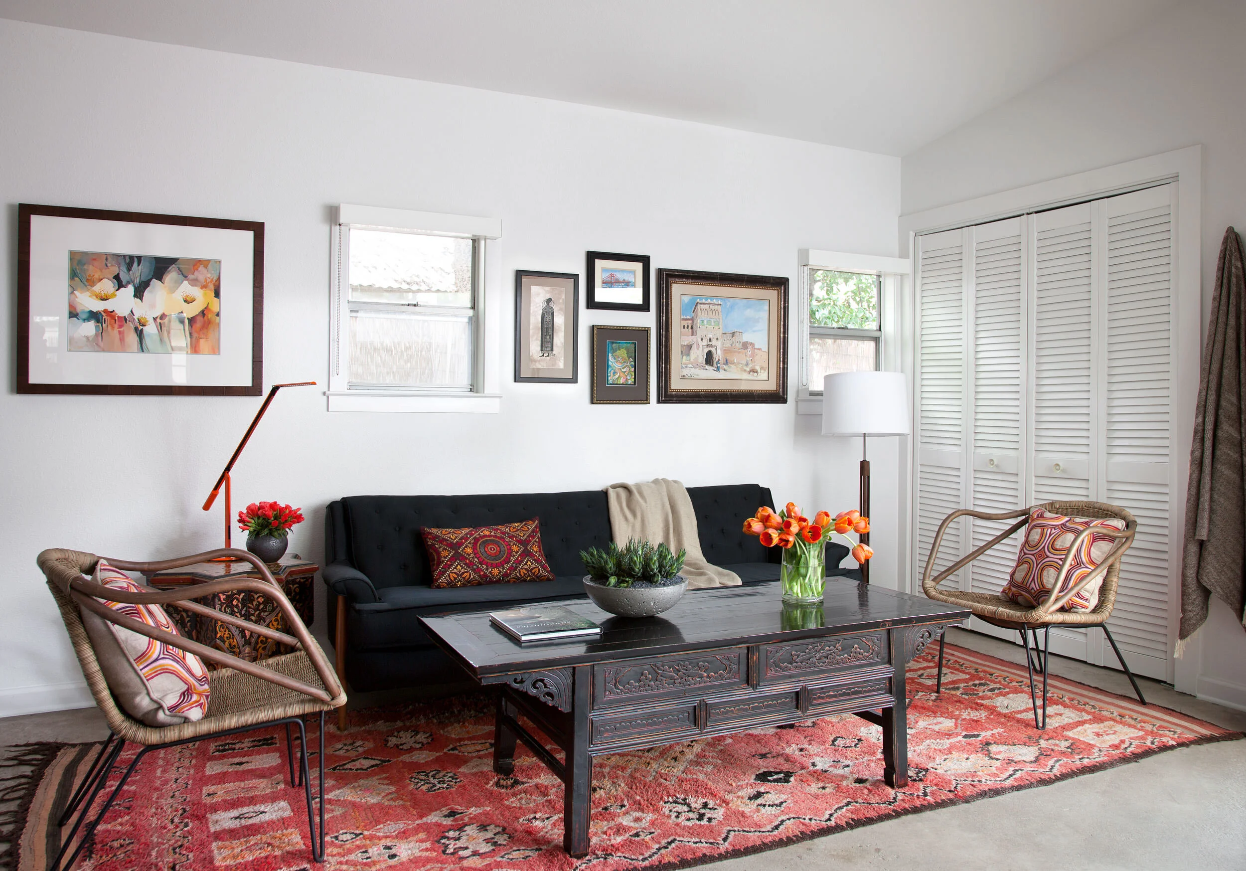 Casita living room with colorful, eclectic furnishings and art at Avenue H, designed by Mark Cravotta. 