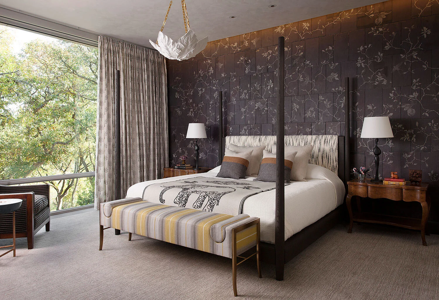  Primary bedroom with hand-painted tile headboard wall in the Rocky River Austin residence by Cravotta Interiors. 