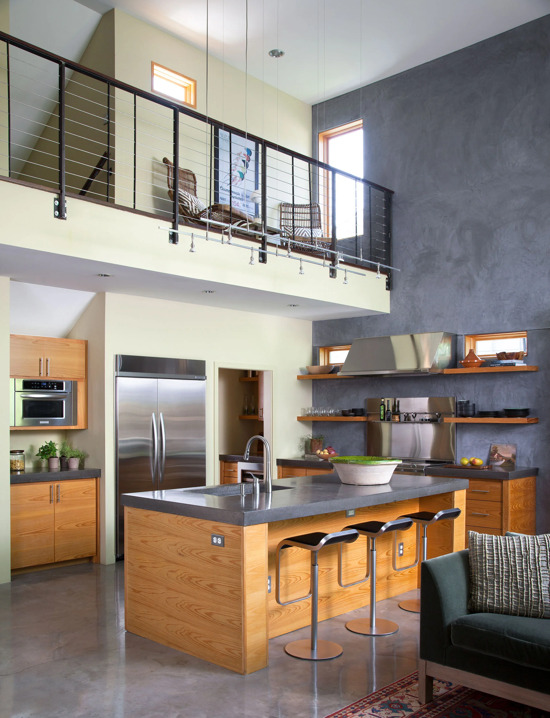  Alternate view of cypress cabinetry and plaster walls in the Zilker Contemporary kitchen by Cravotta Interiors. 
