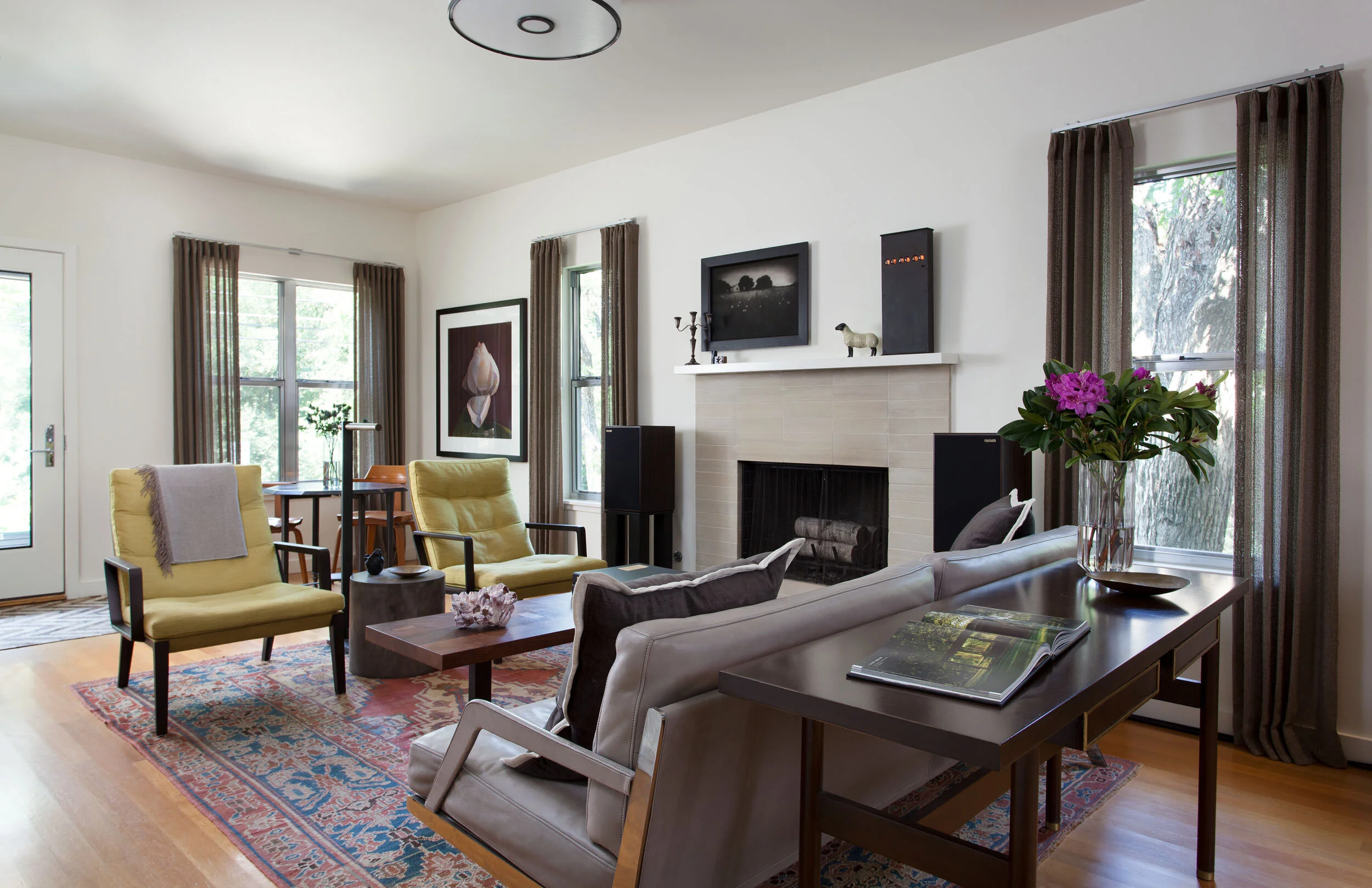  Modern romantic living room in the Clarksville bungalow, designed by Mark Cravotta. 