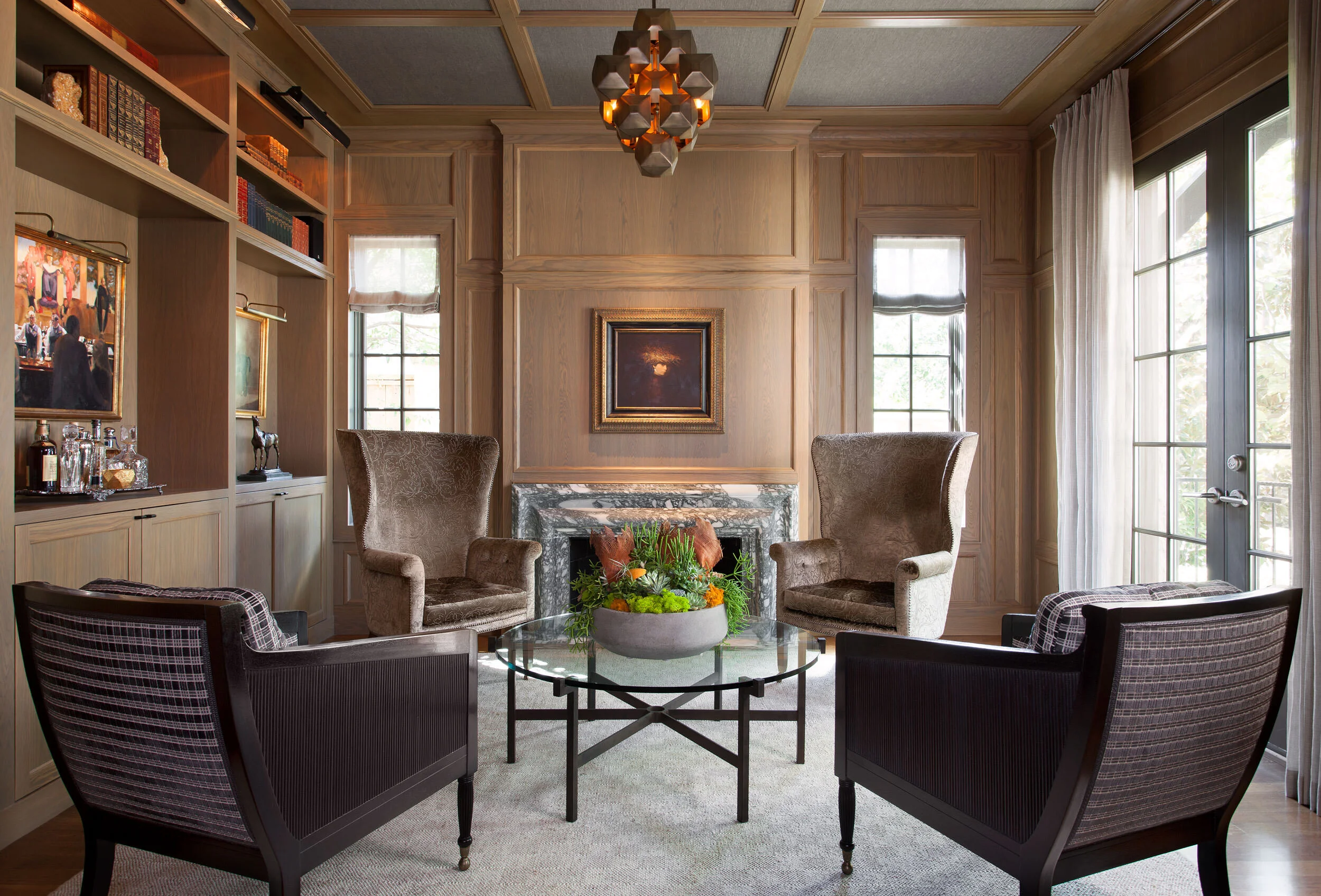  Library lounge with custom oak millwork and fabric ceiling at Northumberland by Cravotta Interiors. 
