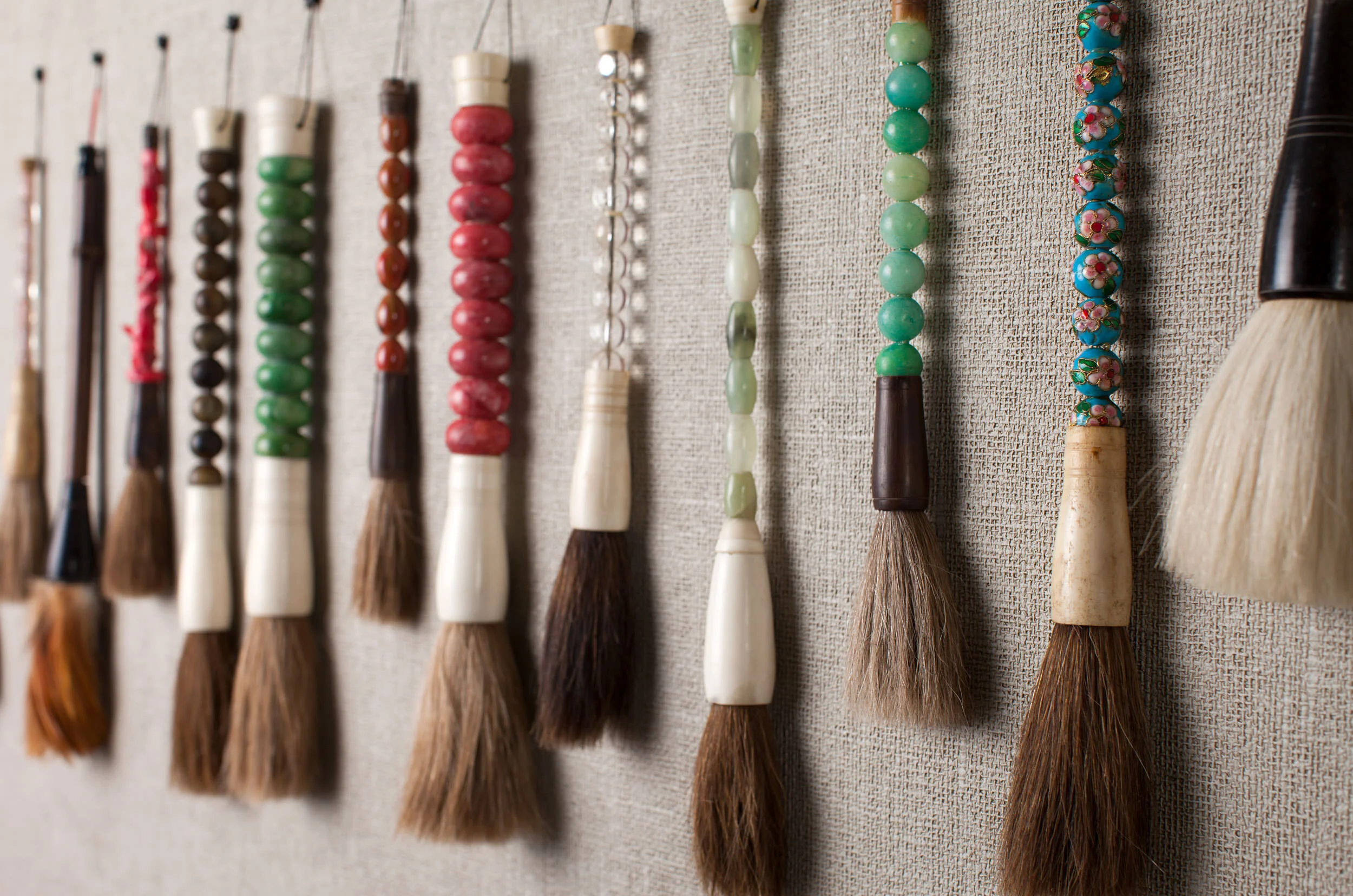  Antique Korean paint brushes displayed as art in the Oseyo restroom, designed by Mark Cravotta. 