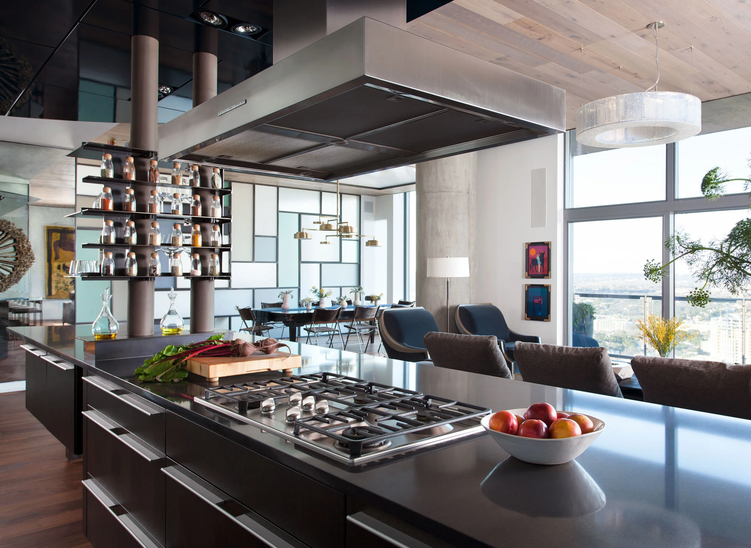  View from the kitchen through to the Mondrian wall and dining area in the W Penthouse, designed by Mark Cravotta. 