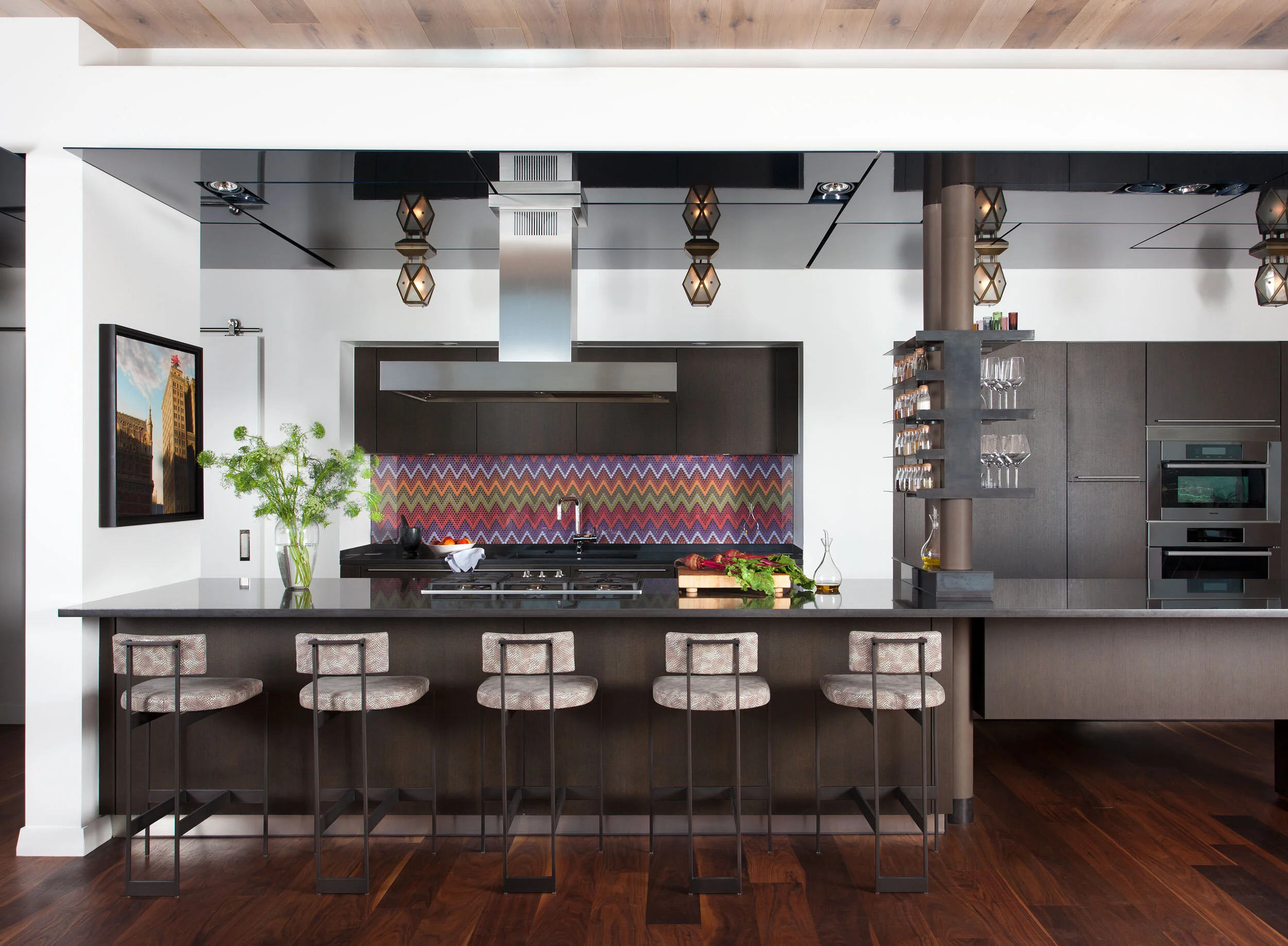  Kitchen with gloss ceiling, Urban Electric pendant lights, and Missoni tile backsplash in the W Penthouse, designed by Mark Cravotta. 
