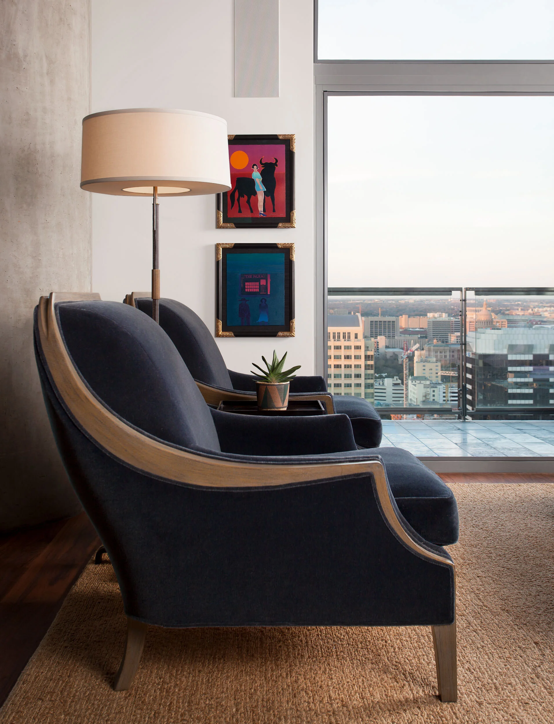  Randolph &amp; Hein lounge chairs with Tom Hammick artwork in the W Penthouse living room, designed by Mark Cravotta. 