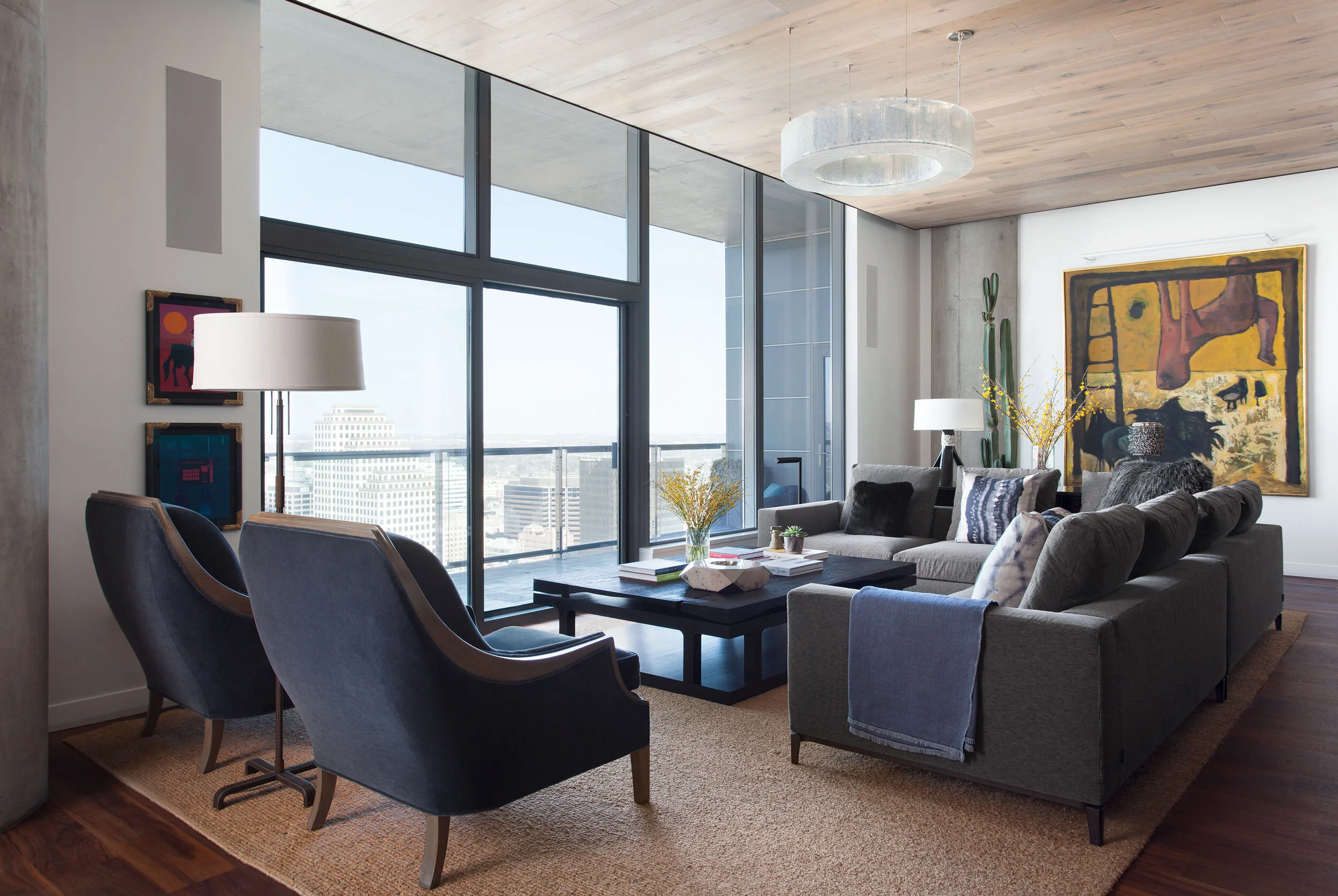 View from the W Penthouse living room toward the terrace, with McEwan chandelier and Minotti seating by Cravotta Interiors. 