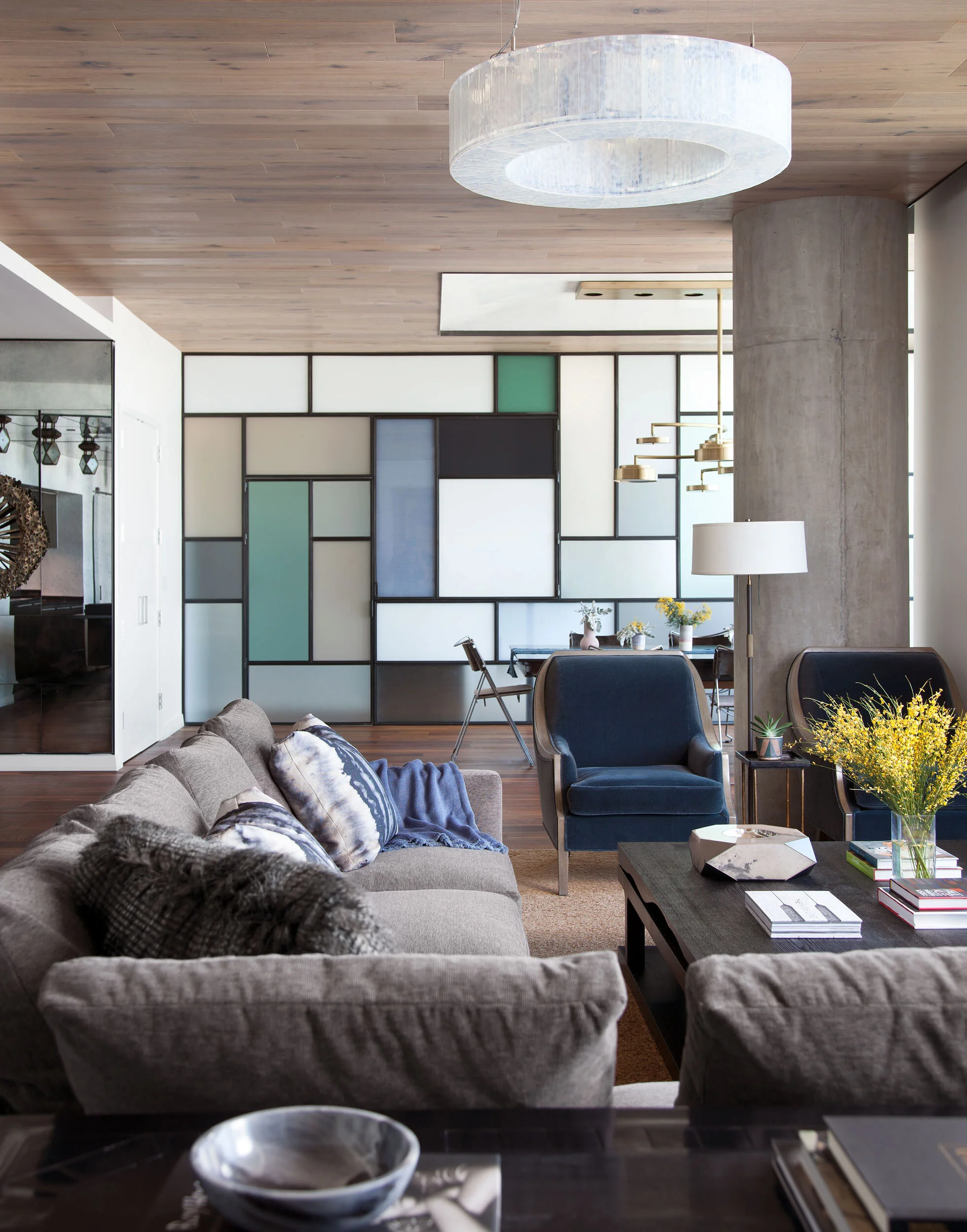  Open view from living room through the Mondrian steel and glass wall to the dining area in the W Penthouse, designed by Mark Cravotta. 
