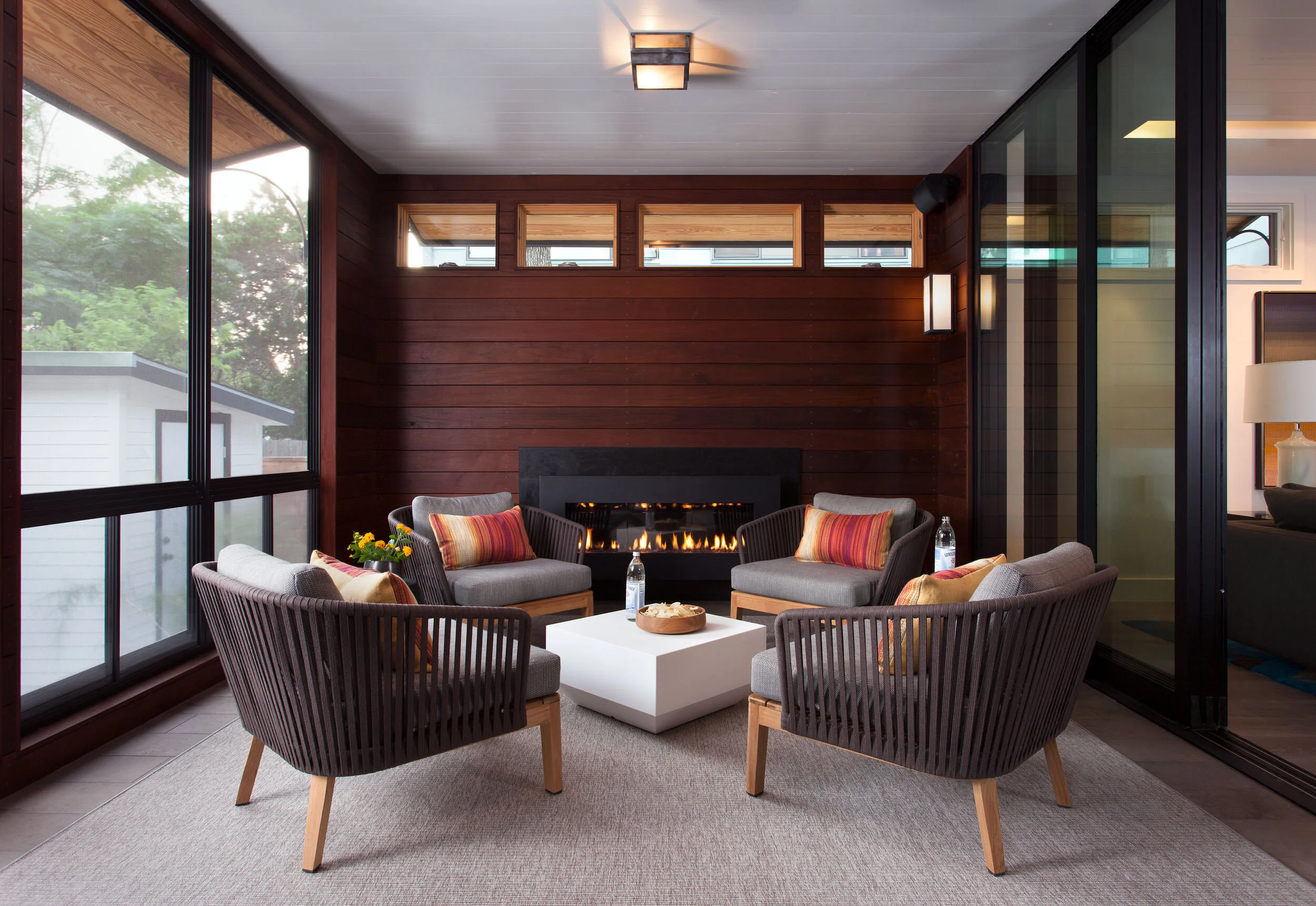  Screened porch with ipe siding for outdoor living at Deep Eddy by Cravotta Interiors. 