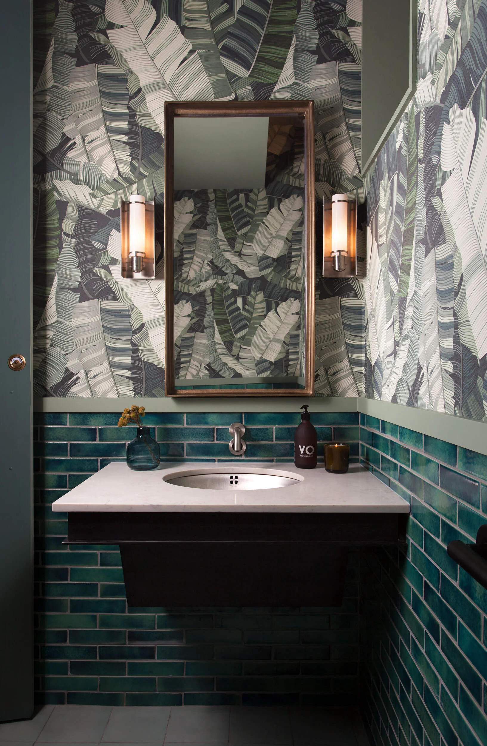  Dramatic green restroom at the Maverick Restaurant, San Antonio, designed by Mark Cravotta. 