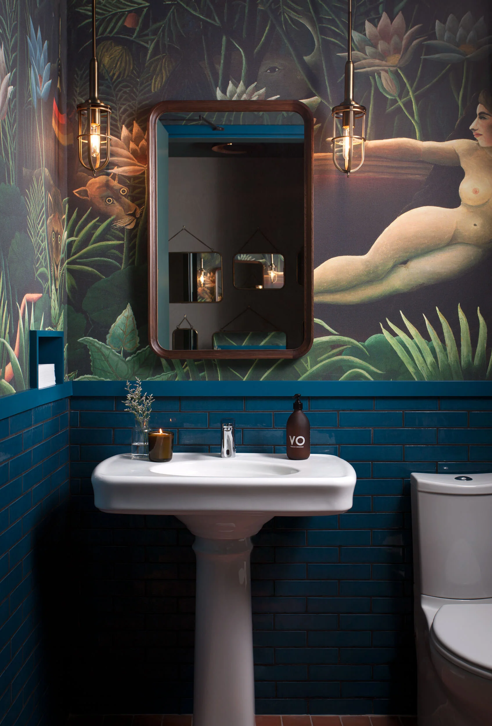  Moody blue restroom in the historic Maverick Restaurant by Cravotta Interiors. 
