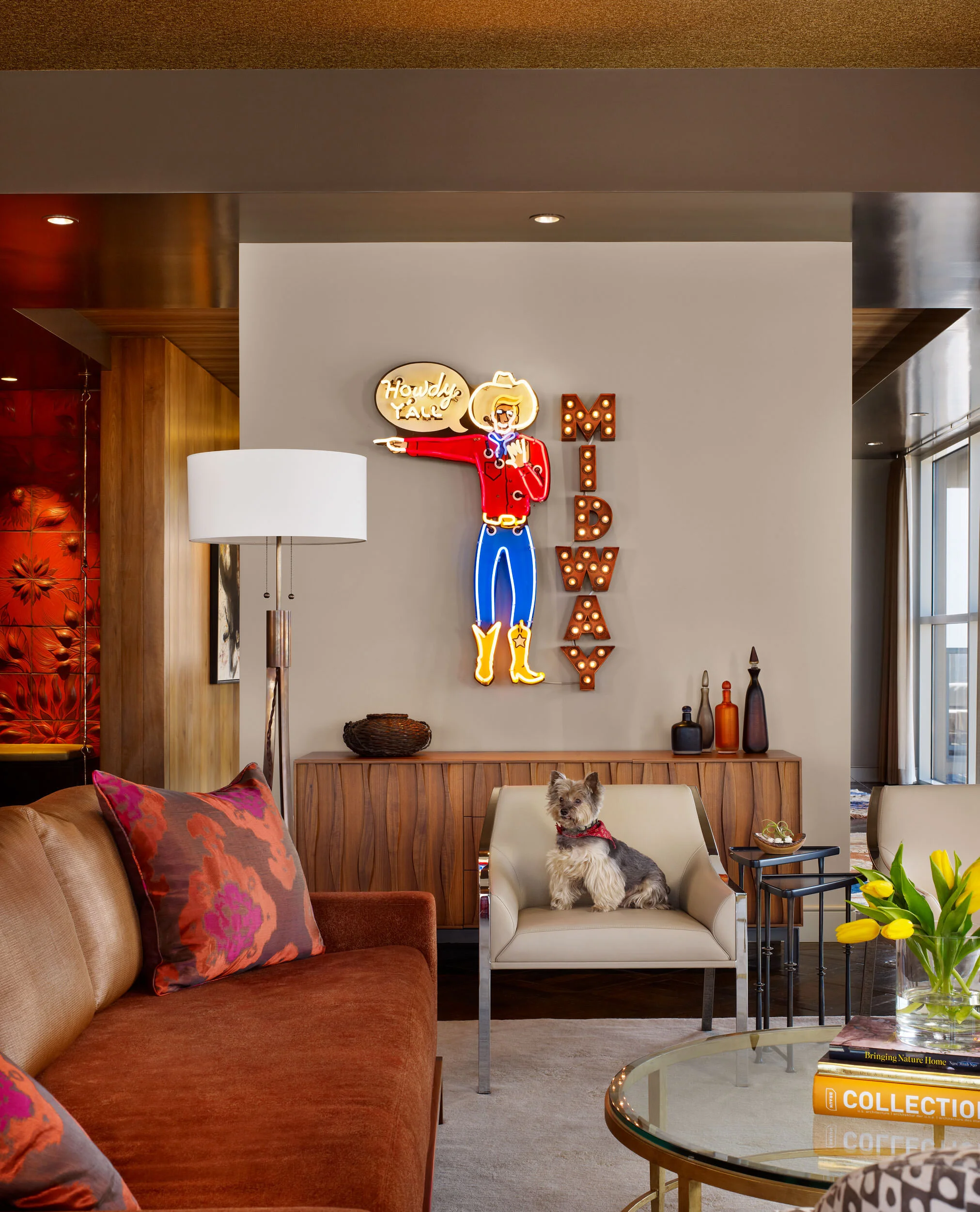  Den with neon art and fire-red sculptural tile at the Four Seasons Penthouse by Cravotta Interiors. 