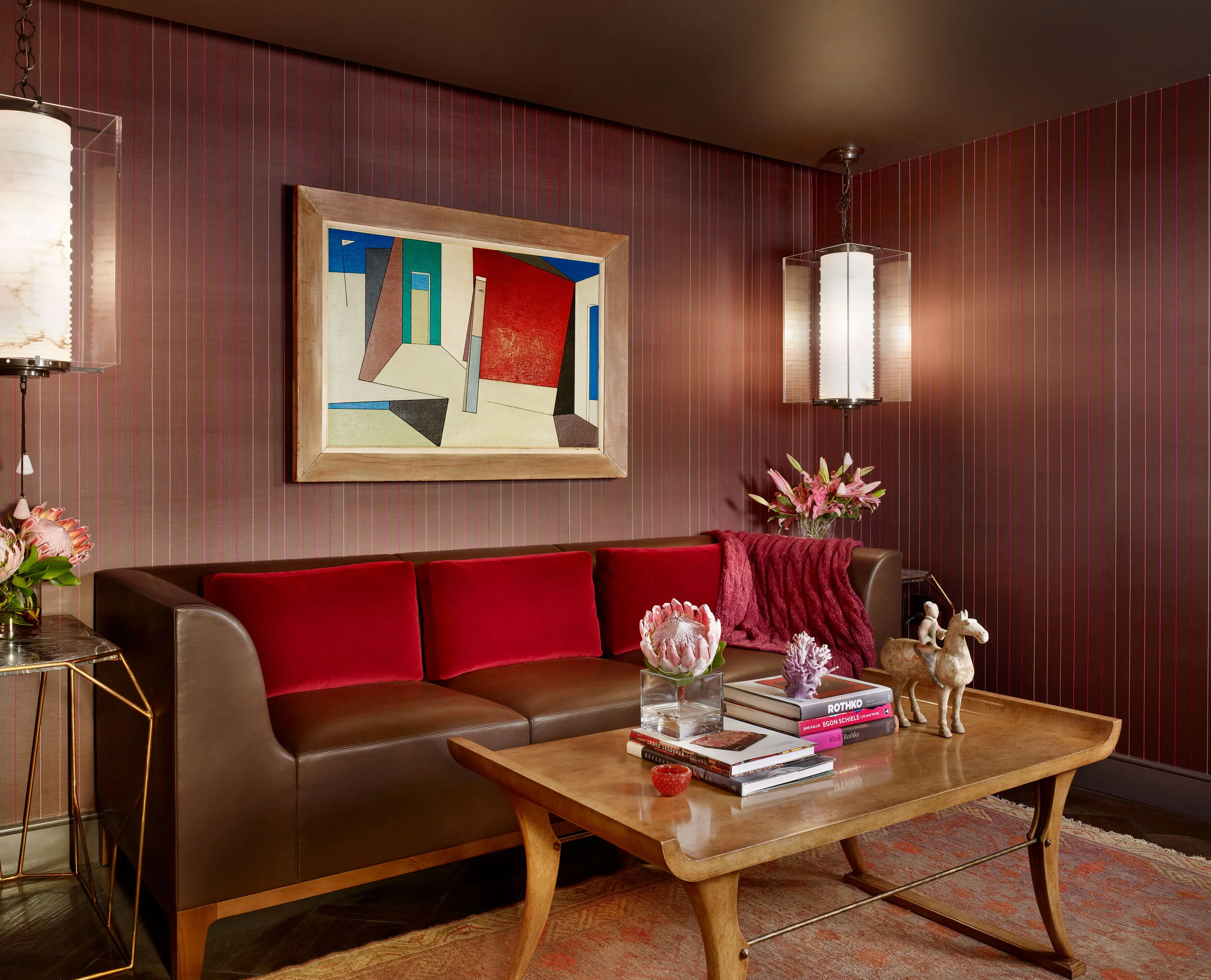  TV room with vibrant embroidered silk wallcovering in deep, rich color at the Four Seasons Penthouse by Cravotta Interiors. 