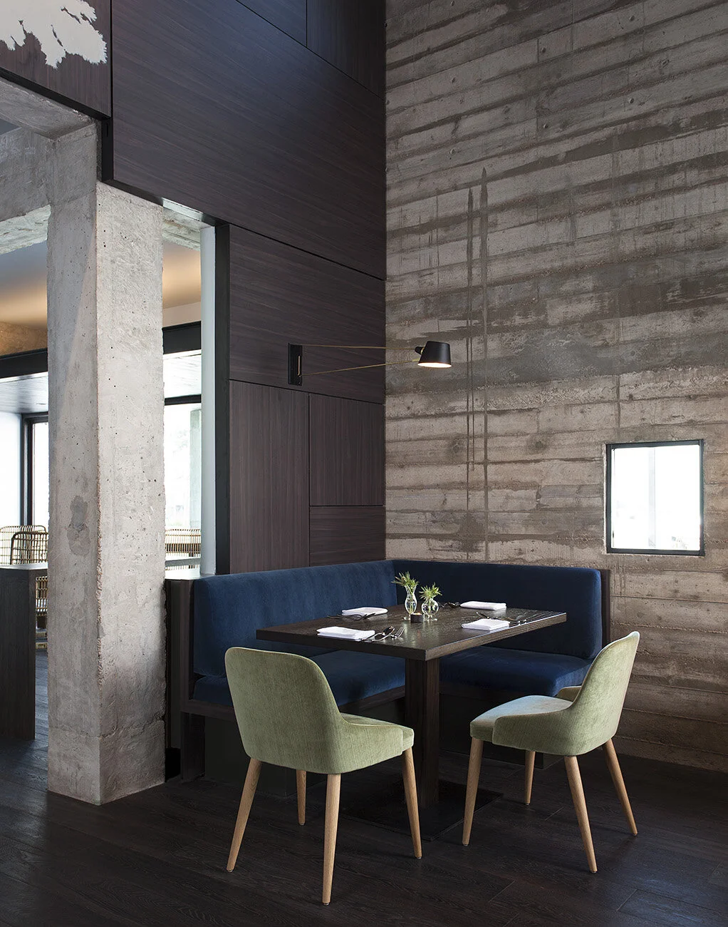  Corner banquette beneath the hand-painted mural at Juniper Restaurant by Cravotta Interiors. 