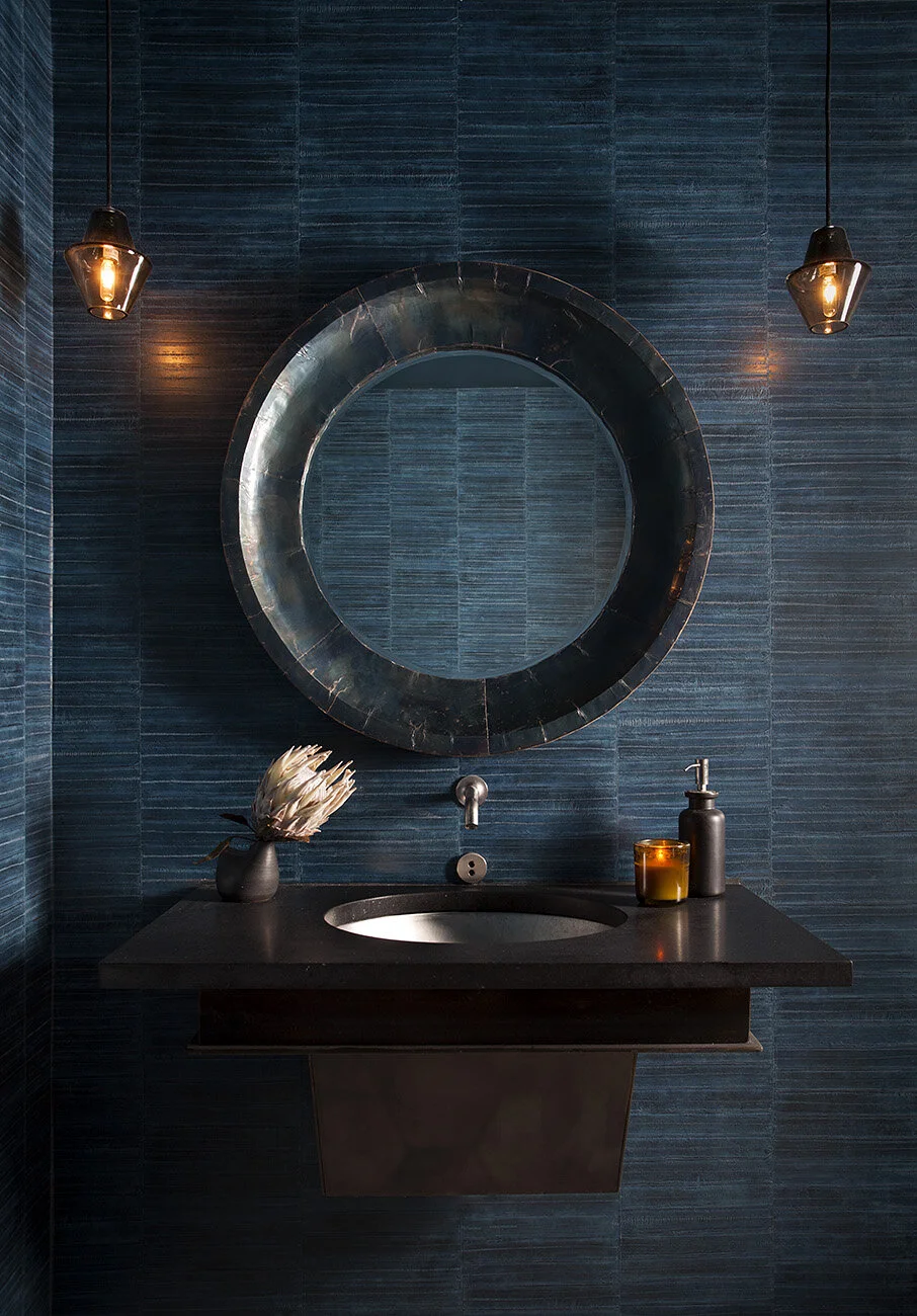  Blue eel skin wallpaper restroom at Juniper Restaurant, Austin, by Cravotta Interiors. 