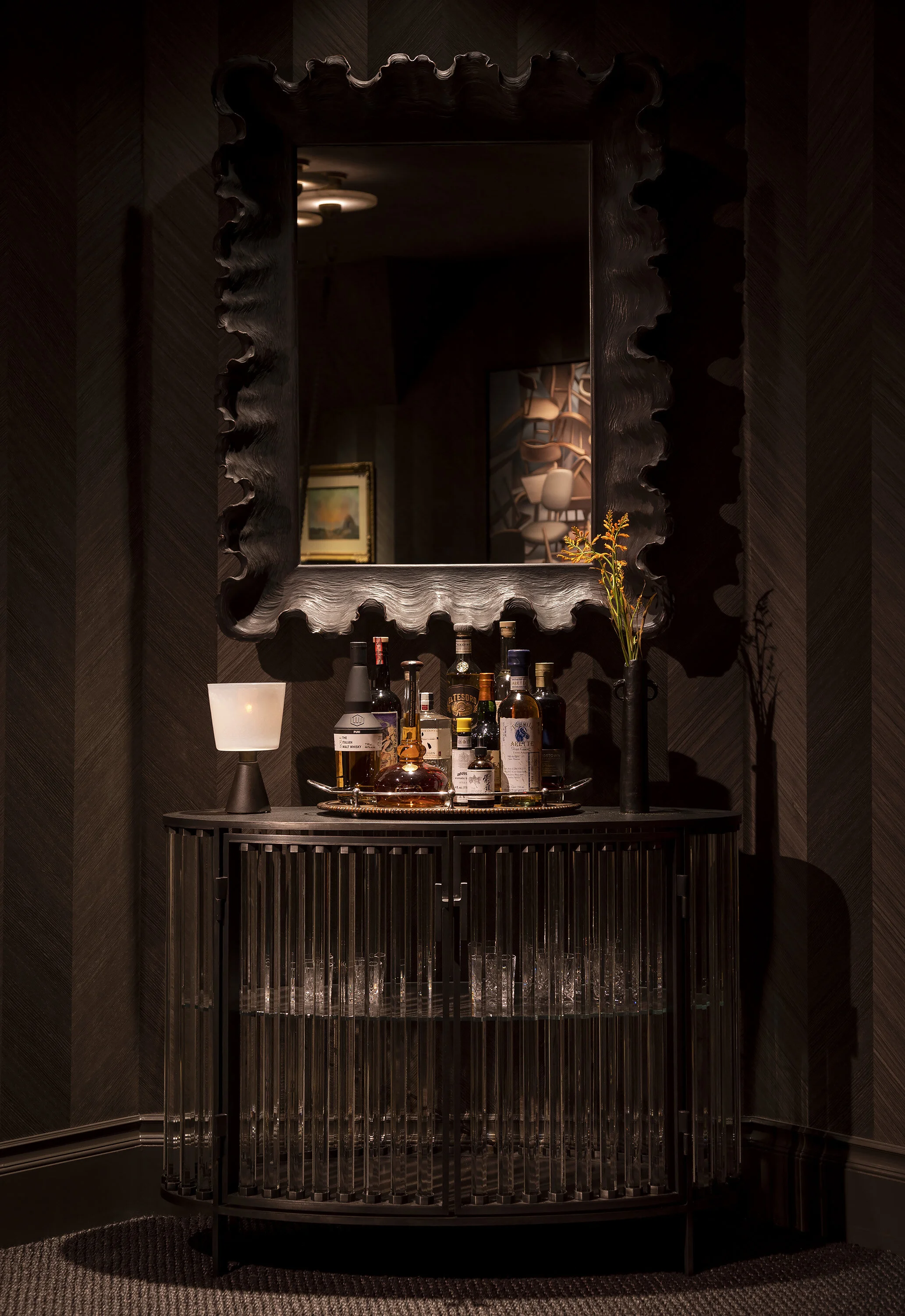  Custom steel and glass bar in the Kips Bay hi-fi room by Cravotta Interiors. 