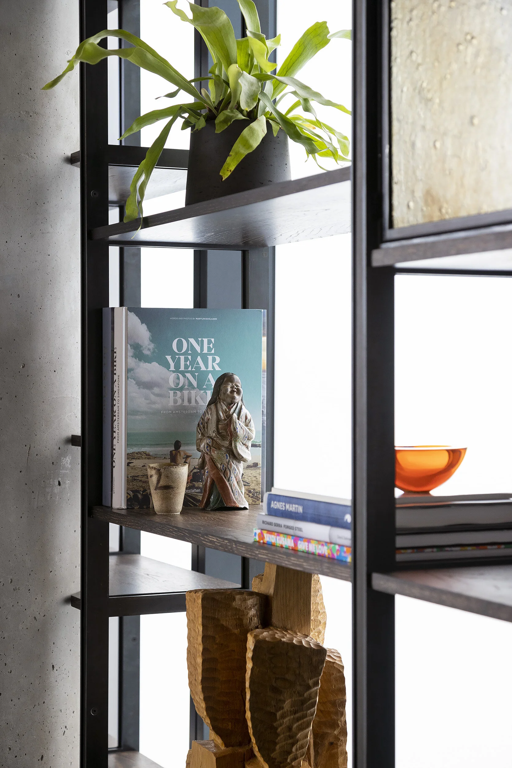  Detail of curated object collection on custom shelving in the Austin Proper Penthouse by Cravotta Interiors. 