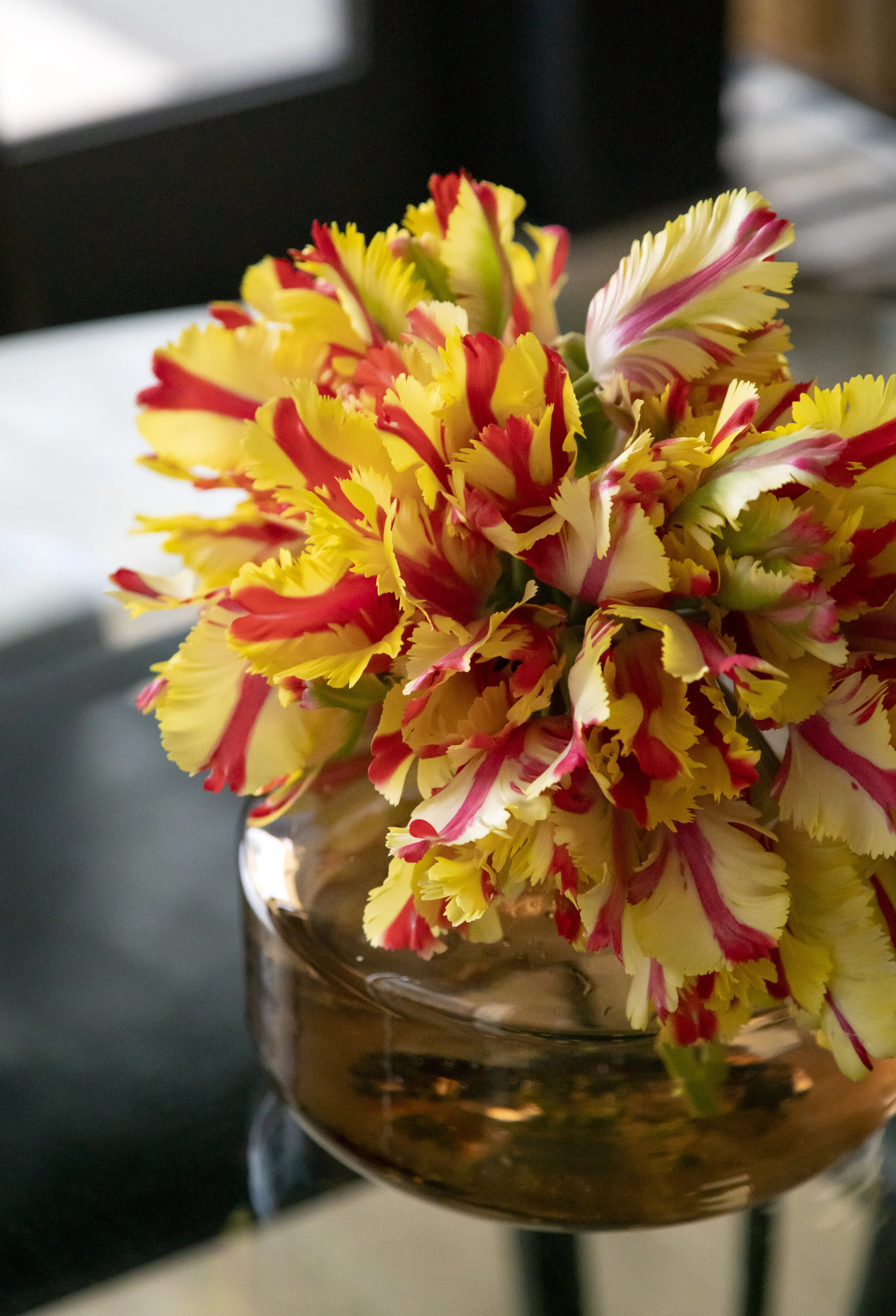  Tabletop floral detail in the colorful Proper Residence by Cravotta Interiors. 
