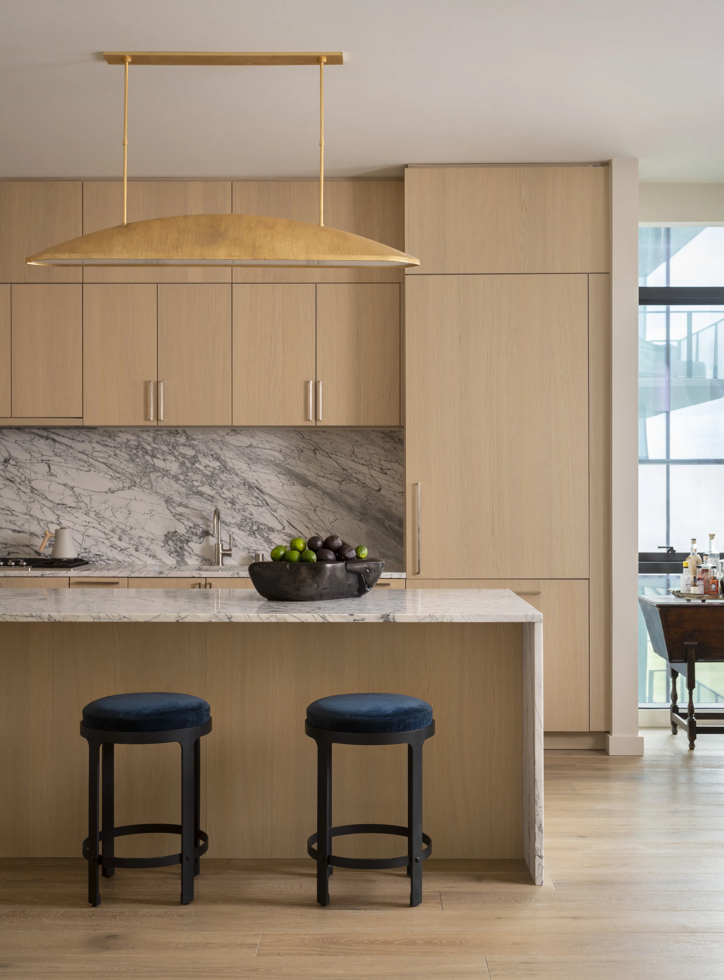  Light, airy kitchen in the Austin Proper high-rise residence, designed by Mark Cravotta. 