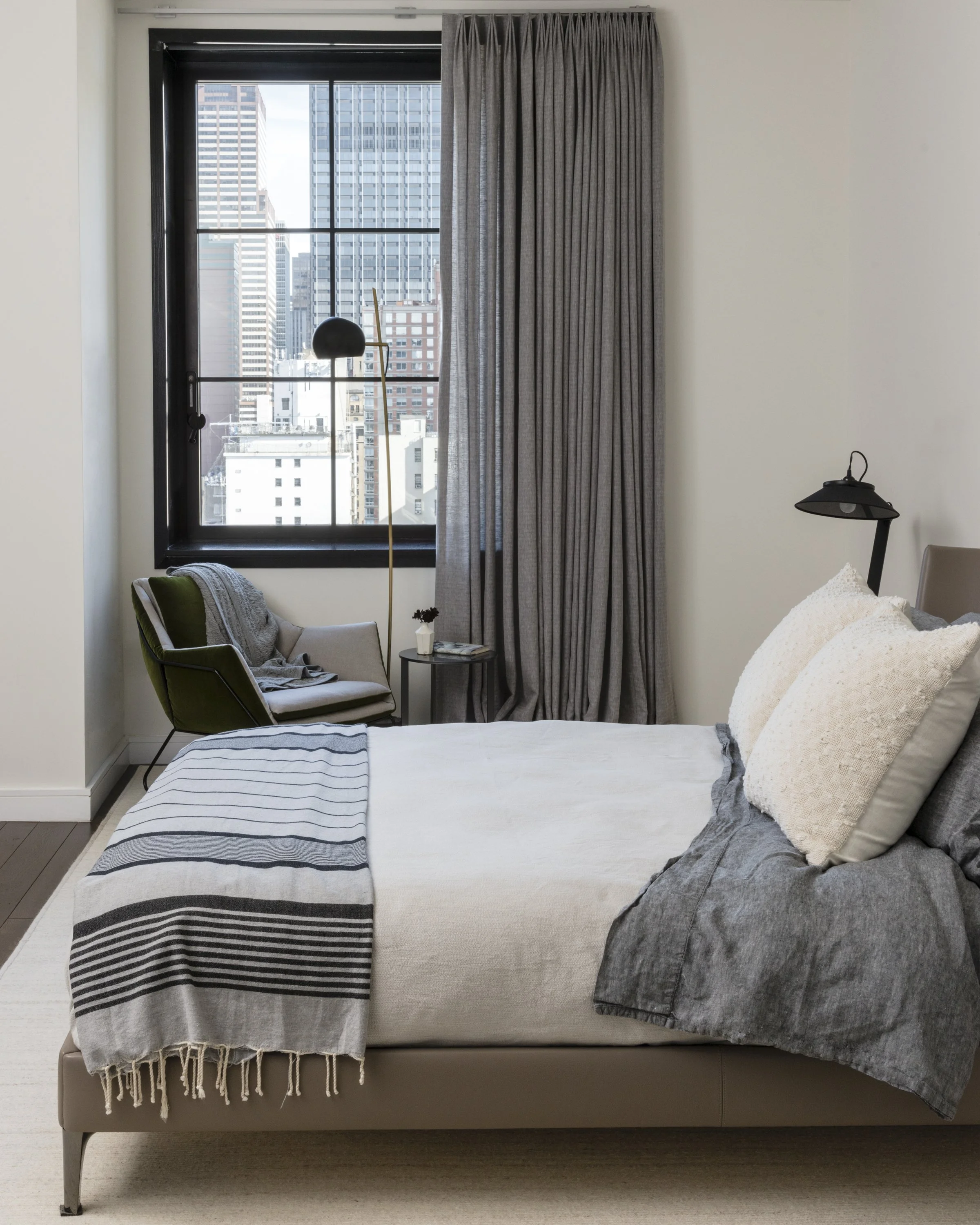  Light, calm bedroom in the Stella NYC condo by Cravotta Interiors. 