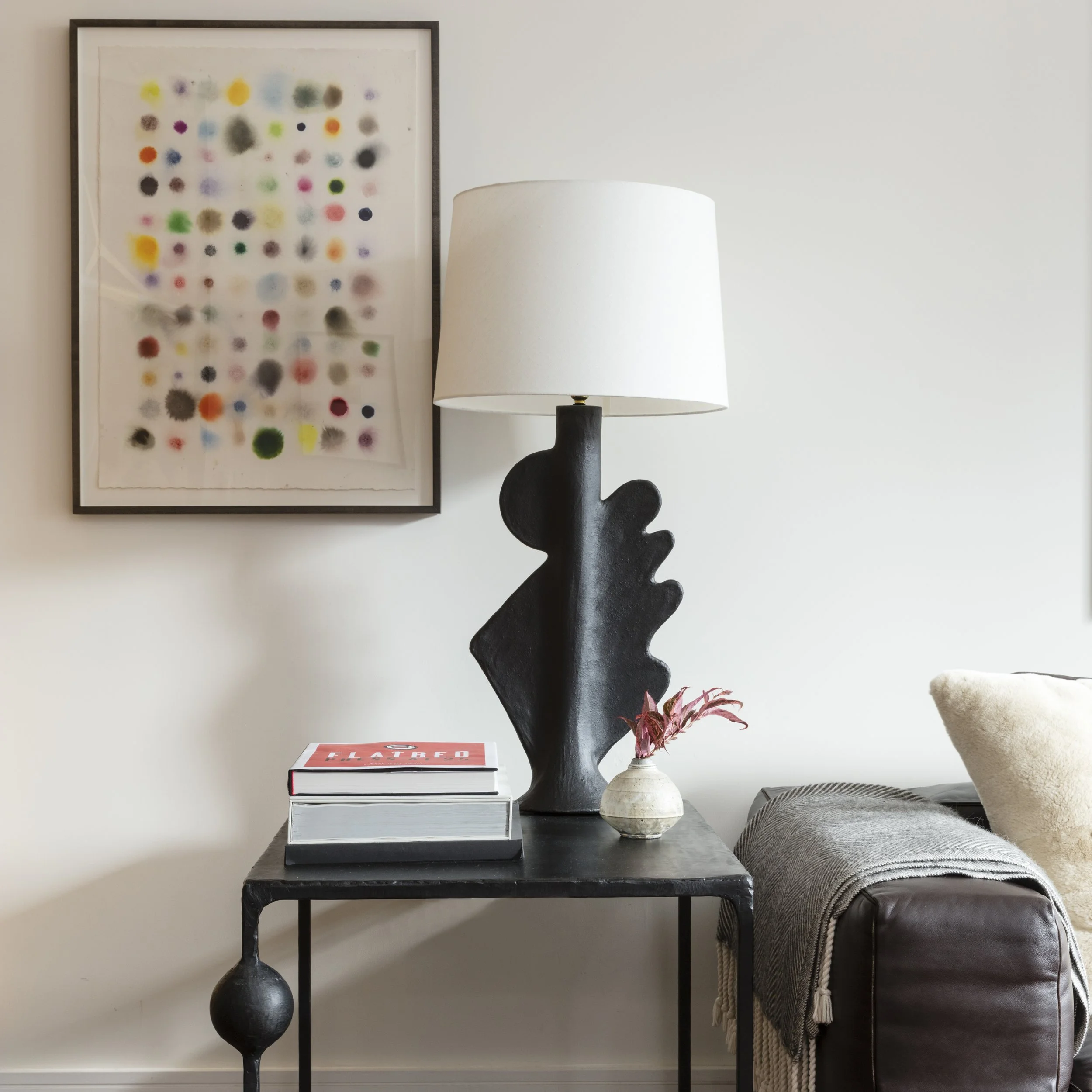  Custom steel side table detail in the Stella NYC living room, designed by Mark Cravotta. 