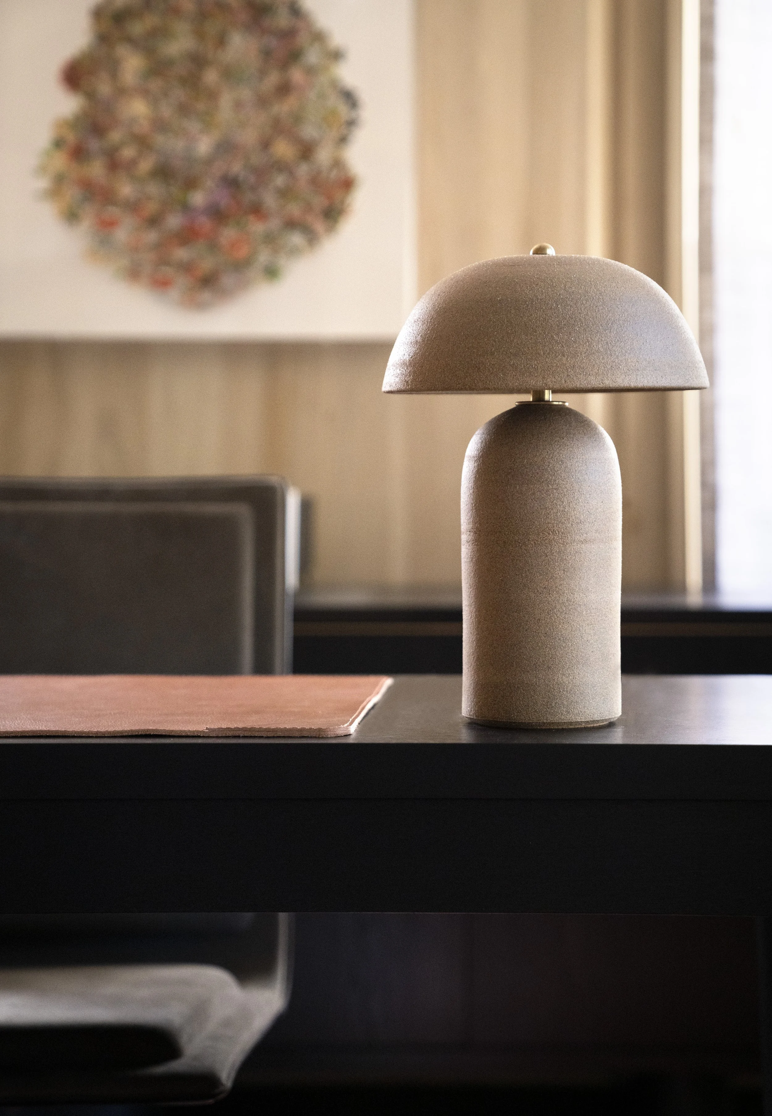  Detail of ceramic lamp and warm oak paneling in the Boulevard Oaks library, designed by Mark Cravotta. 
