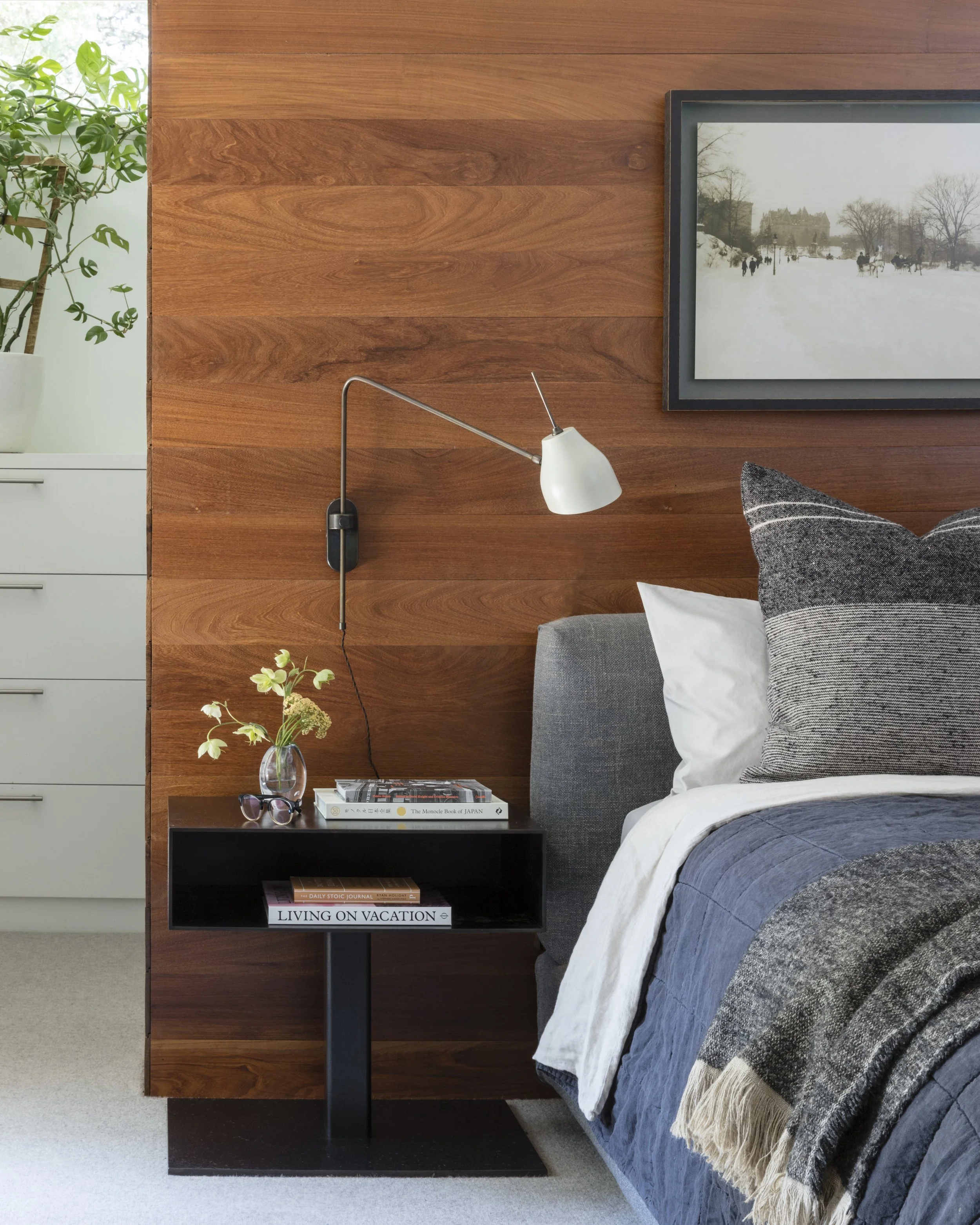  Custom nightstand detail against walnut paneling in the Rabb Road bedroom, designed by Mark Cravotta. 