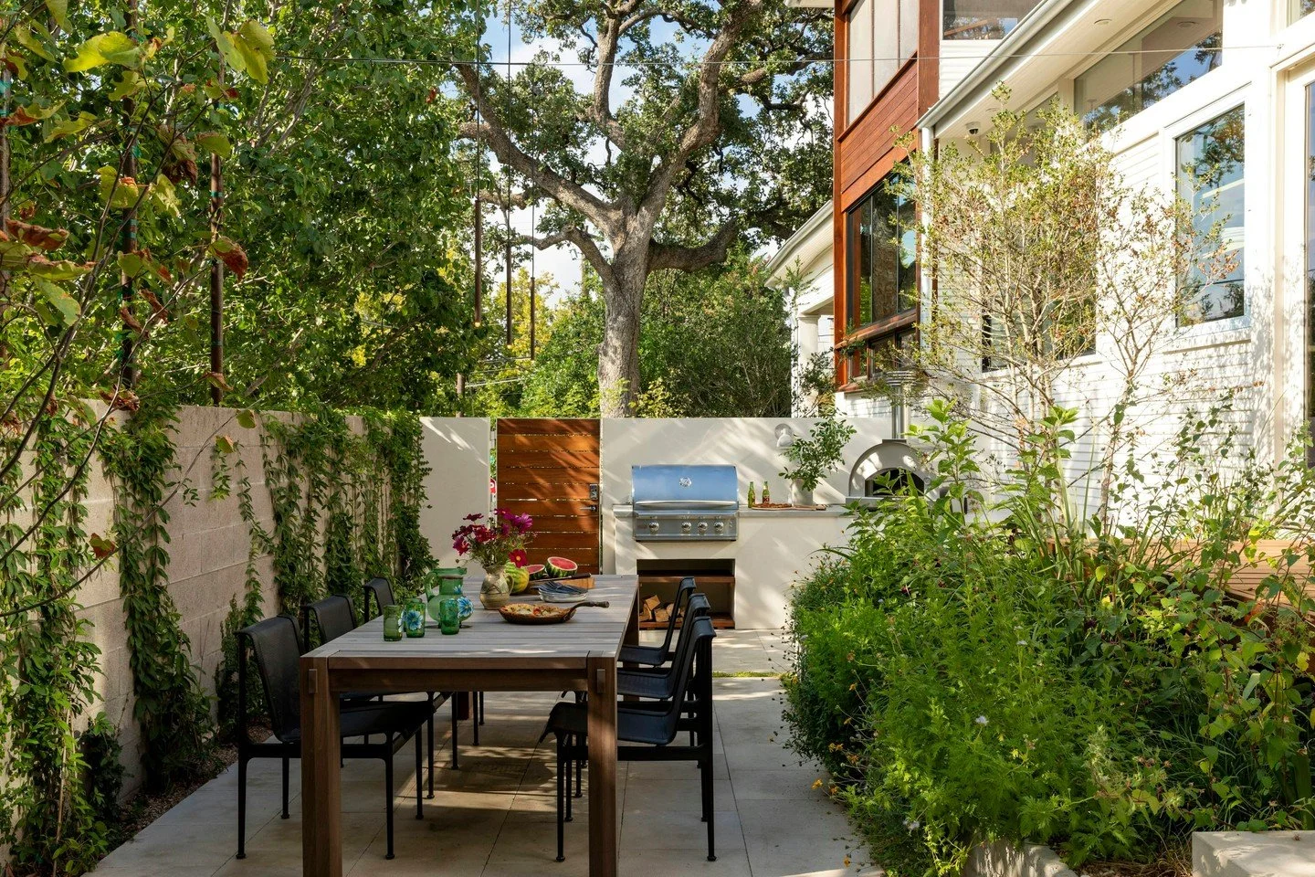 Designed for the months the dinner doesn't move indoors. 

#CravottaInteriors #AustinInteriorDesign #OutdoorLiving #OutdoorDesign